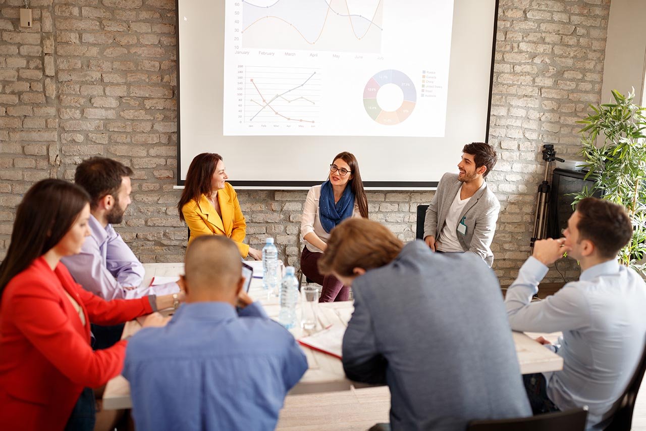 company employees in a presentation