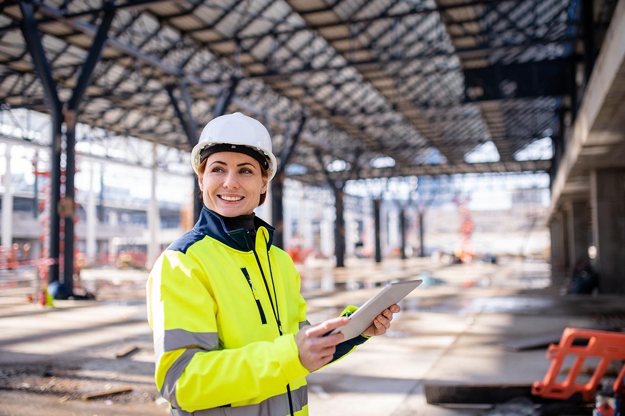 contruction worker with mobile device