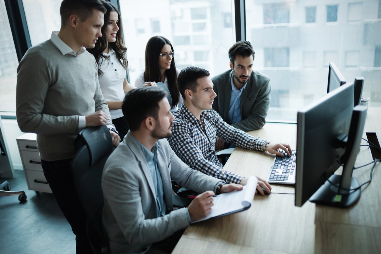 Group of employees during a cybersecurity training - navigating an MFA bypass attack.