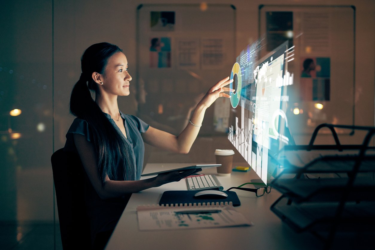 Female IT expert working on a computer using modern technology solutions after a business switch MSPs